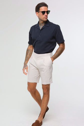 Elevate your summer style with our Stone Linen Shorts, designed for all your special occasions.