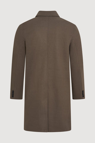 Brown overcoat on a light gray background