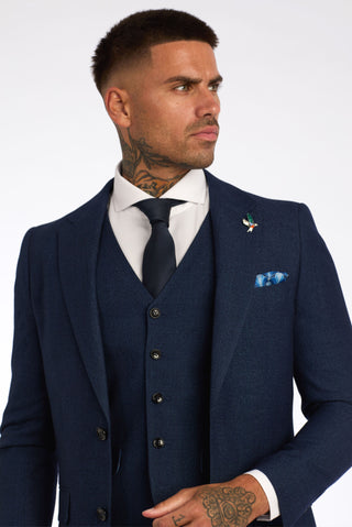 Embrace modern London style with a Harry Brown suit. Discover how to elevate your wardrobe with this sophisticated and stylish option.
